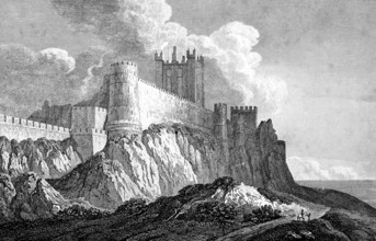 Bamborough Castle or Bamburgh Castle, Northamberland, England, North Sea, shore, rock, square