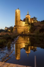 Old water art and St. Michael's Church are reflected in the Spree, night view, Bautzen, Saxony,