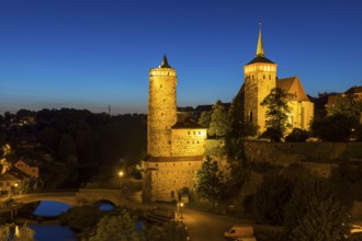 City view at night with Spree, Old Water Art and St. Michael's Church, Bautzen, Upper Lusatia,