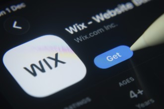 Dhaka, Bangladesh- 01 Dec 2025: A close-up of the Wix app icon in the App Store on an iPad screen
