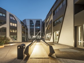 The Sonnenhof at dusk, office and residential building, modern architecture, Jena, Thuringia,