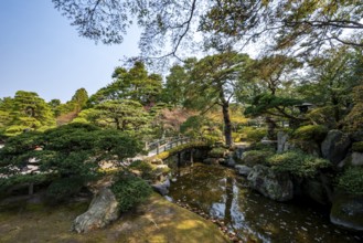 Gonaitei Garden with Dobashi Bridge over a pond, Japanese Garden, Kyoto Imperial Palace, Kyoto,