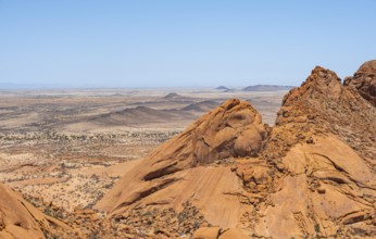 Endless desert landscape with dramatic rock formations and wide horizons, Spitzkoppe, Namibia