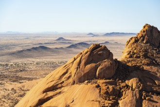 View of the vast, dry landscape of Spitzkoppe from the top of a rock, Spitzkoppe, Namibia