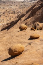 Sloping rocks and stones in a dry desert landscape, Spitzkoppe, Namibia