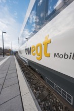 Close-up of a train with visible lettering on the tracks, opening of the Hermann Hesse Railway,
