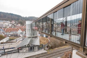 A glazed bridge with a view of the city's buildings, opening of the Hermann Hesse Railway, Calw,