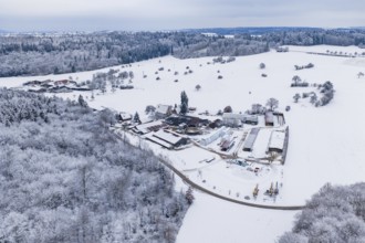 Snow-covered farm in a vast winter landscape, surrounded by forests, Haselstaller Hof, Gechingen,