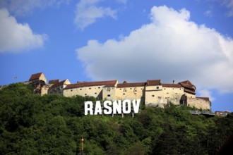 On the hill the medieval fortress Rasnov, Rosenau Castle, Brasov County, Transylvania, Romania