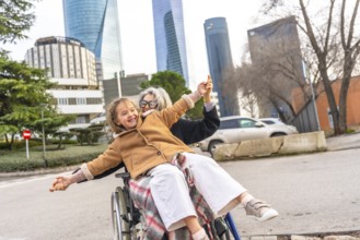 Loving grandmother and granddaughter sharing a joyful moment, playing together while enjoying an