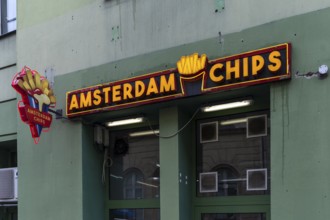 Illuminated advertising for chips, Krakow, Poland