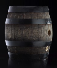 Beer keg against black background, studio shot against black background