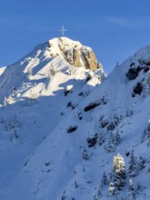 Snow-covered summit of Branderschrofen with summit cross, Tegelberg in winter, Schwangau, Allgäu
