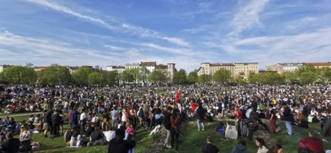 May 1, public holiday, Labor Day in Görlitzer Park in Berlin, many people sitting relaxing on the