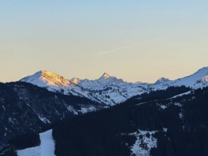 Grossglockner mountain peak in evening light at sunset, seen from Hochbrixen, Kitzbühel Alps,