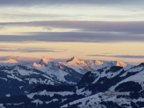 Alpine glow at sunset, mountain peaks in the Kitzbühel Alps in winter, Brixental, Tyrol, Austria