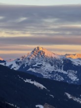 Alpine glow at sunset, Kitzbühler Horn mountain peak in winter, Brixental, Kitzbühel Alps, Tyrol,