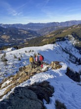 Three friends hiking trail to the summit of Feldalphorn, winter hiking, Kitzbühel Alps, Tyrol,