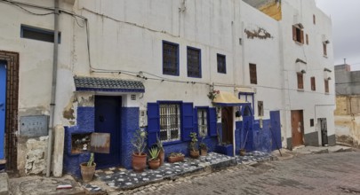 Charming building with white and blue accents in traditional neighborhood, southern Morocco
