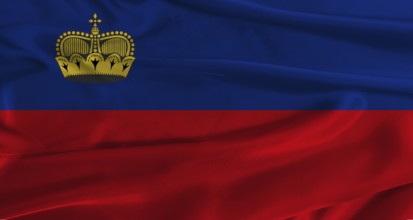 Flag of Liechtenstein with fabric textured background. Close up of National flag of Liechtenstein
