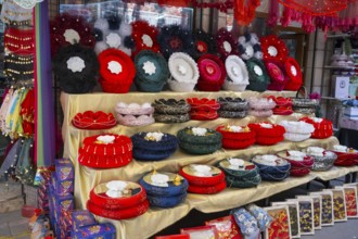 Welcoming shop with a colorful selection of handmade henna sets, henna tray and basket set, covered