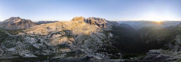 Impressive mountain peaks of the Brenta Mountains, 360 degree alpine panorama, evening mood, aerial