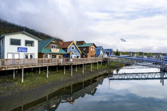 Colourful houses on the harbor, with reflection, Seward, Kenai Peninsula, Alaska, USA
