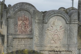 Coloured relief of a five-armed candleholder on a tombstone, Jewish cemetery, since 1866,