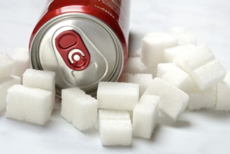 Cola can and lots of sugar cubes