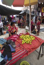 Mayan woman wearing traditional clothes at the market in Chichicastenango, Highlands, El Quiché