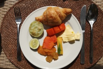 Rich breakfast at the hotel with fruits and vegetables, Ubud, Bali, Indonesia