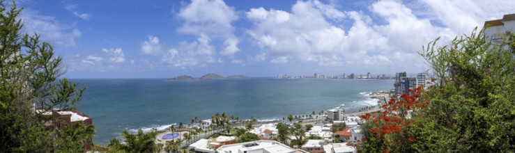 Panoramic view of scenic Mazatlan sea promenade and waterfront El Malecon with ocean lookouts,
