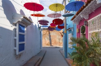 Colorful streets of Cartagena in historic Getsemani district near Walled City, Ciudad Amurallada