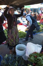 Mayan woman wearing traditional clothes at the market in Sololá, Highlands, Sololá Department,