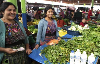 Mayan woman wearing traditional clothes at the market in Sololá, Highlands, Sololá Department,