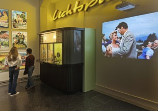 Cinema from the 1950s as a presentation with movie posters, box offices and original films, House