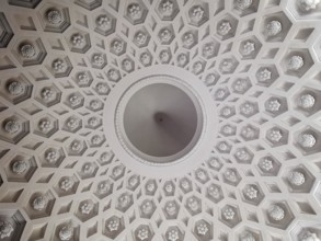 Geometrically decorated dome ceiling with symmetrical pattern and classic decorations, Warsaw,