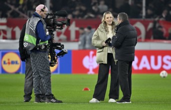 RTL TV expert Lothar Matthäus interviewed with reporter presenter Laura Papendick microphone micro