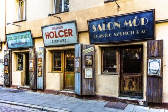 Shop fronts on Szeroka Street, signs bearing Polish and Jewish names, Kazimierz, a historically