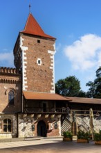 Florian's Gate with city wall and defensive towers, Krakow, Poland