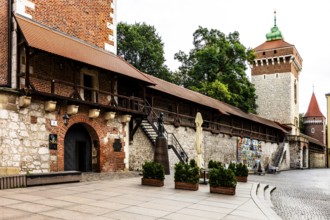 Florian's Gate with city wall and defensive towers, Krakow, Poland
