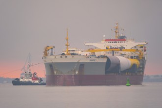 A semi-submersible ship is towed from the Weser to the North Sea, Bremerhaven, Bremen, Germany