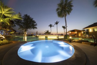 Illuminated swimming pool on Koh Chang Island, Andaman Sea, Southern Thailand, Thailand