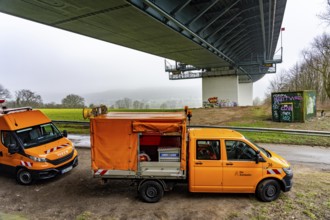 Autobahn GmbH vehicles under the Ruhr Valley Bridge, work in the bridge box, during the closure of