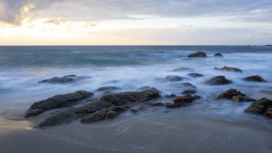 Sunrise on the beach, coast near Sadah, Oman