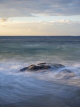 Sunrise on the beach, coast near Sadah, Oman