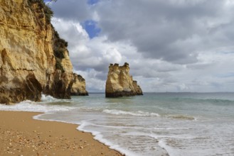 Rocky coast and beach, Praia do Pinhao, Lagos, Algarve, Portugal