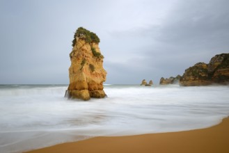 Rocks on the coast in the surf, Praia Dona Ana, Lagos, Algarve, Portugal