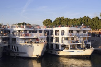 Nile cruise ships at the pier at the double temple of Kom Ombo, Kom Ombo, Egypt
