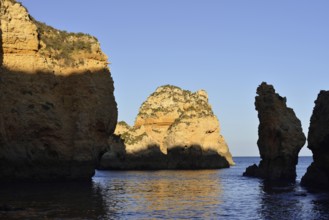 Rocky coast in evening light, Ponta da Piedade, Lagos, Algarve, Portugal